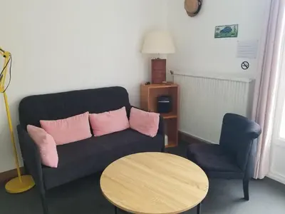 Coin salon dans l'établissement Appartement lumineux avec jardin à Amboise