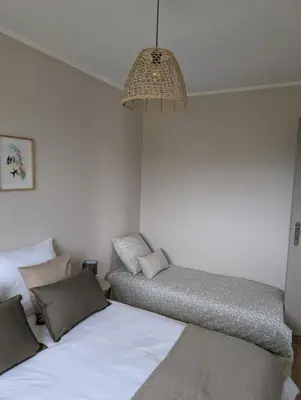Un ou plusieurs lits dans un hébergement de l'établissement GITE cosy et tout équipé - 5 min du zoo et proche des châteaux