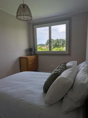 Un ou plusieurs lits dans un hébergement de l'établissement GITE cosy et tout équipé - 5 min du zoo et proche des châteaux