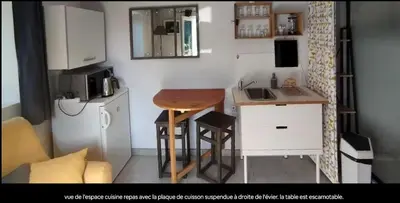 Cuisine ou kitchenette dans l'établissement P'tite Maison