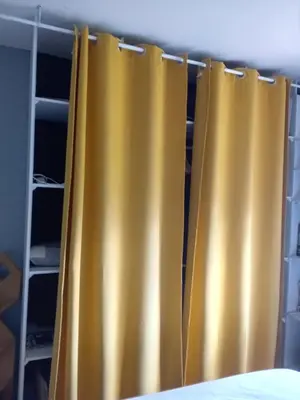 Un ou plusieurs lits dans un hébergement de l'établissement Chambre no1 meublé chez habitant