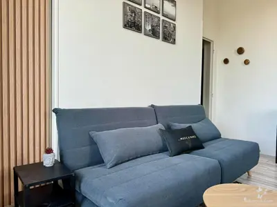 Coin salon dans l'établissement Appartements Balcony de Loire