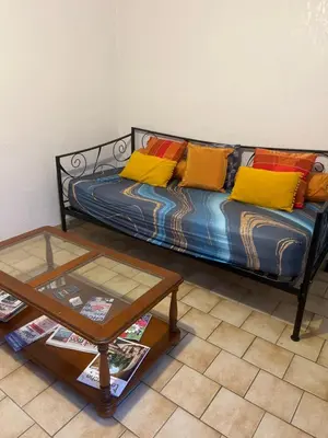 Un ou plusieurs lits dans un hébergement de l'établissement La petite maison