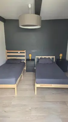 Un ou plusieurs lits dans un hébergement de l'établissement Maison