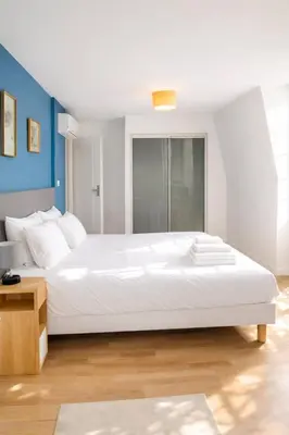 Un ou plusieurs lits dans un hébergement de l'établissement La maison aux 5 nids