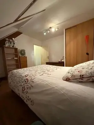 Un ou plusieurs lits dans un hébergement de l'établissement Appartement confortable avec piscine à Cour-Cheverny