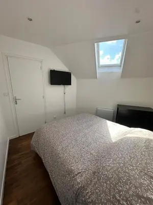 Un ou plusieurs lits dans un hébergement de l'établissement Maison de Village