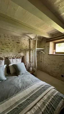 Un ou plusieurs lits dans un hébergement de l'établissement Gîte entier - Alleu des Bois