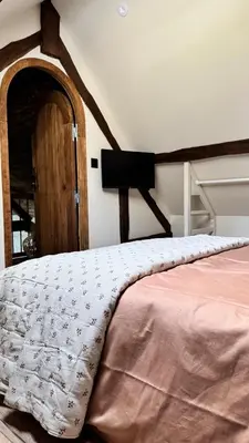 Un ou plusieurs lits dans un hébergement de l'établissement Gîte entier - Alleu des Bois