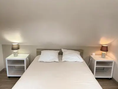 Un ou plusieurs lits dans un hébergement de l'établissement Charmant gîte à Chailles près de Blois avec jardin et WIFI - FR-1-491-468