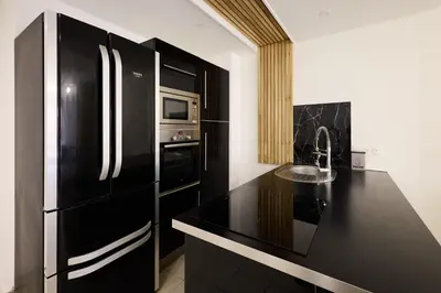 Cuisine ou kitchenette dans l'établissement La Terrasse du Bonheur