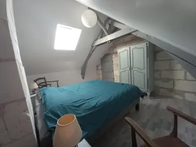 Un ou plusieurs lits dans un hébergement de l'établissement Gîte aux Pissenlits