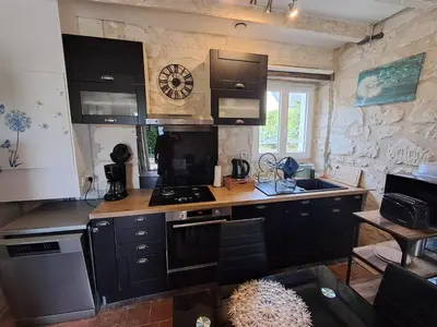 Cuisine ou kitchenette dans l'établissement Gîte aux Pissenlits