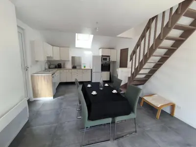 Cuisine ou kitchenette dans l'établissement Maisons A
