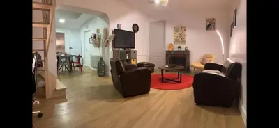 Coin salon dans l'établissement maison 6 personnes 15 min du circuit
