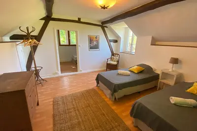 Un ou plusieurs lits dans un hébergement de l'établissement La maison du gardien