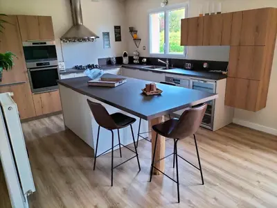 Cuisine ou kitchenette dans l'établissement Maison circuit 24 heures du Mans