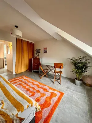 Un ou plusieurs lits dans un hébergement de l'établissement Charming Studio In Le Mans Chasse Royale