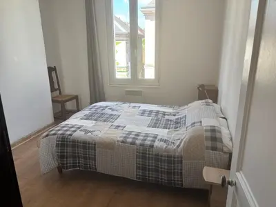 Un ou plusieurs lits dans un hébergement de l'établissement Appartement centre ville Chateau-Renault