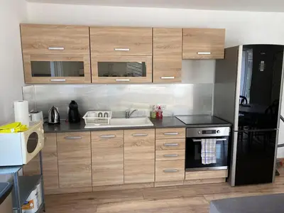 Cuisine ou kitchenette dans l'établissement Maison proche toutes commodités