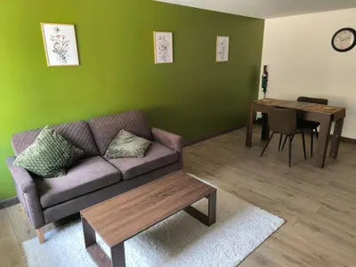 Coin salon dans l'établissement Gites les Bon' aparte gite 2