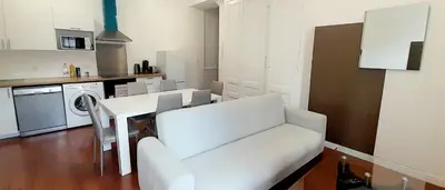 Cuisine ou kitchenette dans l'établissement Charmant appartement 6 pers