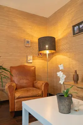 Coin salon dans l'établissement Le Pavillon Flacé