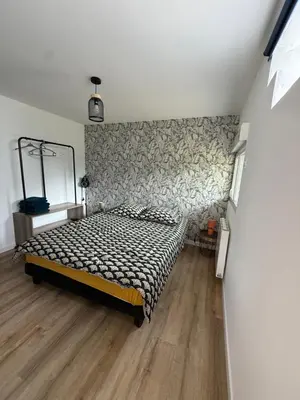 Un ou plusieurs lits dans un hébergement de l'établissement Appartement type 2 à corné