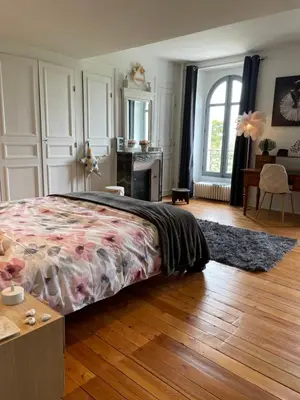 Un ou plusieurs lits dans un hébergement de l'établissement Chateau aux portes du circuit des 24h