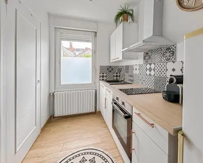 Cuisine ou kitchenette dans l'établissement Cosy et calme, lit double, proche transports
