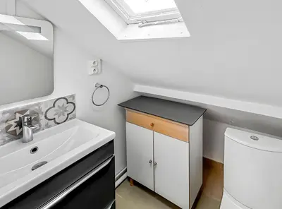 Cuisine ou kitchenette dans l'établissement Charmant studio - vue parc- proche transports