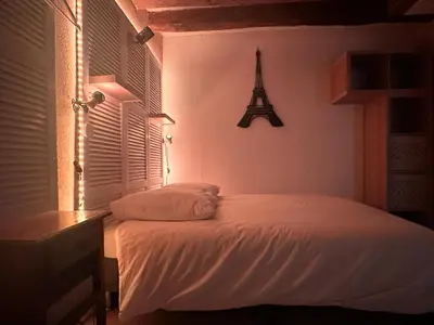 Un ou plusieurs lits dans un hébergement de l'établissement Le petit Gite de Vendome