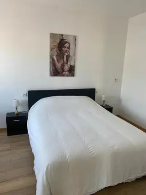 Un ou plusieurs lits dans un hébergement de l'établissement Maison calme à la campagne