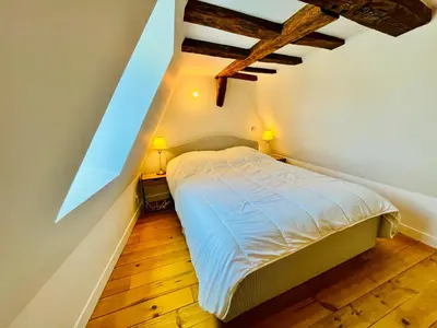 Un ou plusieurs lits dans un hébergement de l'établissement Centre-ville, cathédrale, cosy, duplex, le numéro 12