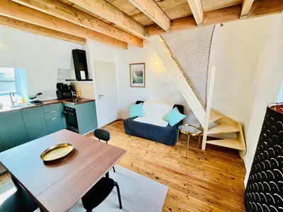 Coin salon dans l'établissement Centre-ville, cathédrale, cosy, duplex, le numéro 12