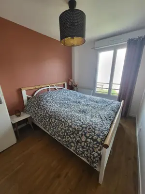Un ou plusieurs lits dans un hébergement de l'établissement Chambre chez l'habitant