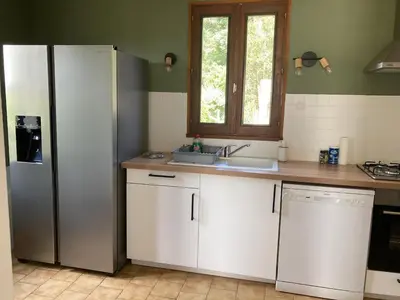 Cuisine ou kitchenette dans l'établissement La Maisonnette