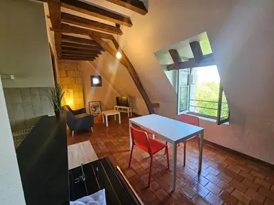 Coin salon dans l'établissement T2 historique de charme Saumur