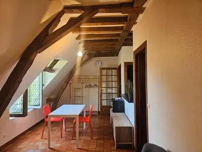 Coin salon dans l'établissement T2 historique de charme Saumur