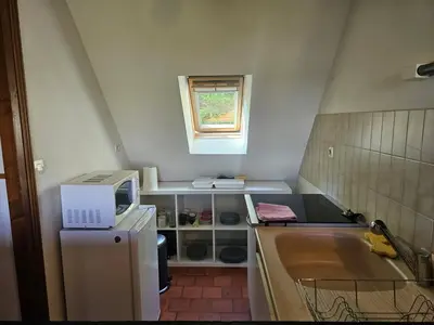Cuisine ou kitchenette dans l'établissement T2 historique de charme Saumur