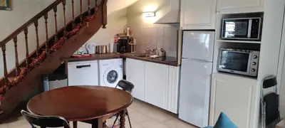 Cuisine ou kitchenette dans l'établissement Gîte Le Prieuré