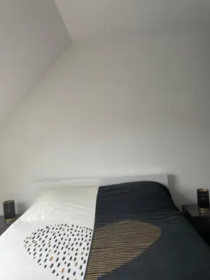Un ou plusieurs lits dans un hébergement de l'établissement Chambre double lit King size