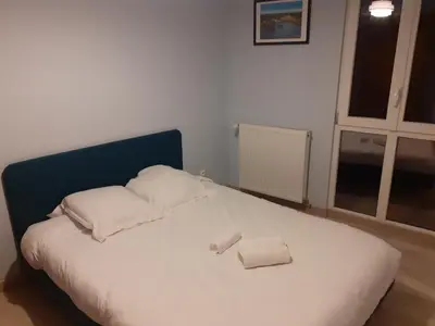 Un ou plusieurs lits dans un hébergement de l'établissement Gite Maisonnette avec terrasse - hyper centre Amboise