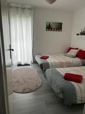 Un ou plusieurs lits dans un hébergement de l'établissement Villa 5km du circuit 24h Le Mans