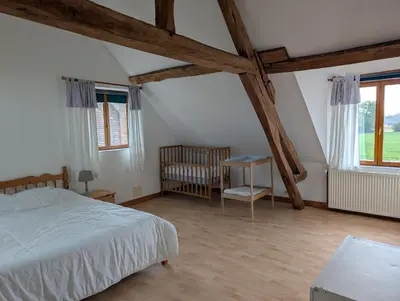 Un ou plusieurs lits dans un hébergement de l'établissement Les Hiboux
