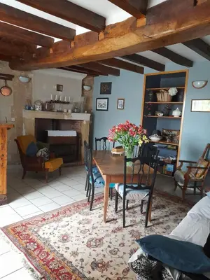 Coin salon dans l'établissement Gîte de baigneux 2 étoiles