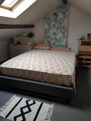 Un ou plusieurs lits dans un hébergement de l'établissement Chambre proche circuit 4 personnes