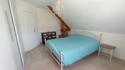 Un ou plusieurs lits dans un hébergement de l'établissement Croix Georgette chambre d'hôte