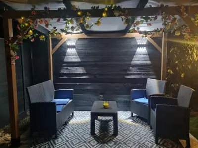 Coin salon dans l'établissement Très belle dépendance relaxante totalement indépendante