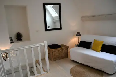 Un ou plusieurs lits dans un hébergement de l'établissement La Petite Maison d'à Côté